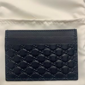 Gucci embossed logo card case